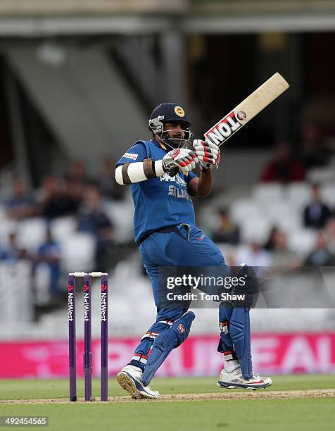 Lahiru Thirimanne of Sri Lanka hits out during NatWest T20 International match between England and Sri Lanka at The Kia Oval on May 20, 2014 in...