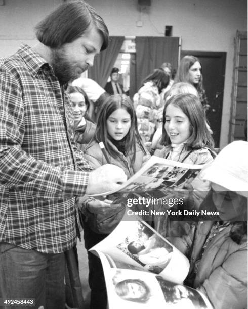 The Beach Boys in Concert at Madison Square Garden An entire new generation of fans gathers around Brian Wilson, who obliges with his autograph after...