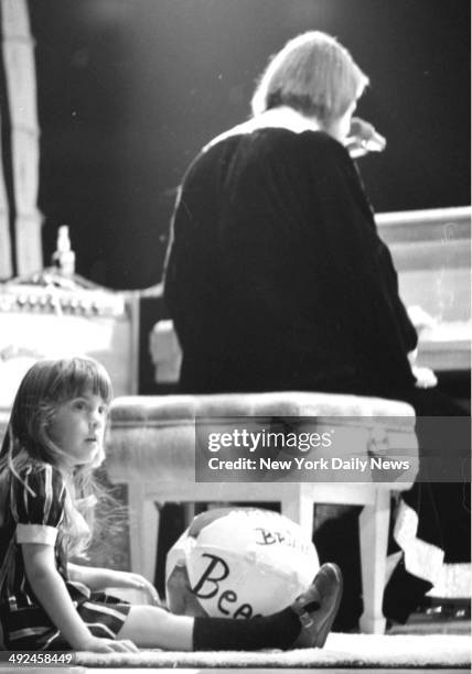 The Beach Boys in Concert at Madison Square Garden Summer Love, Mike Love daughter, sits on stage and listens as Brian Wilson, at the piano, performs...