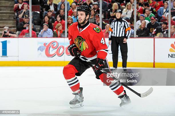 Niklas Hjalmarsson of the Chicago Blackhawks watches for the puck in Game Five of the Second Round of the 2014 Stanley Cup Playoffs against the...