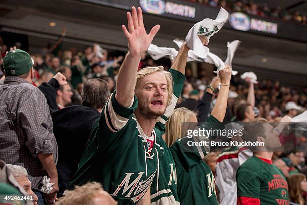 Minnesota Wild fans cheer on their team against the Chicago Blackhawks during Game Six of the Second Round of the 2014 Stanley Cup Playoffs on May...