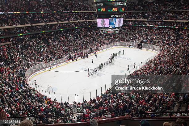 The Minnesota Wild and Chicago Blackhawks shake hands following Game Six of the Second Round of the 2014 Stanley Cup Playoffs on May 13, 2014 at the...