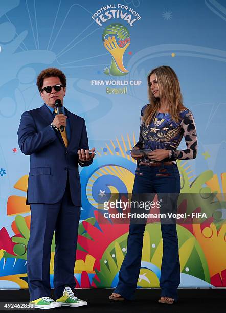 Romero Britto and Fernanda Lima visit the Launch of the Fotball for Hope Festival on May 20, 2014 in Rio de Janeiro, Brazil.