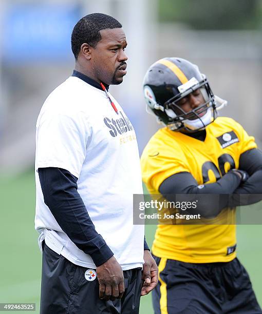 Assistant coach Joey Porter of the Pittsburgh Steelers looks on during rookie minicamp at the Pittsburgh Steelers Training Facility on May 16, 2014...