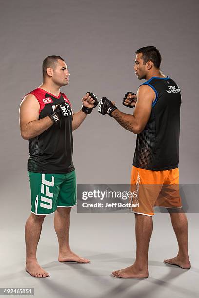 Coach Cain Velasquez and coach Fabricio Werdum pose for a portrait on media day during filming of The Ultimate Fighter Latin America on May 15, 2014...