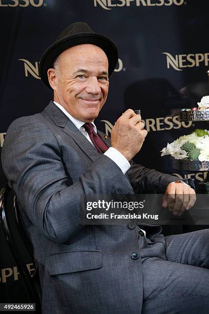 Heiner Lauterbach poses during the opening of the smallest pop-up cafe in town by NESPRESSO on October 13, 2015 in Munich, Germany.