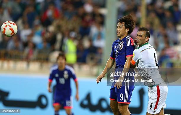 Okazaki Shinji and Seyed Jalal Hosseini in Action during the international friendly match between Iran and Japan at Azadi Stadium on October 13, 2015...