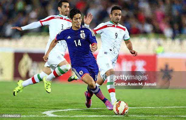 Muto Yoshinori in Action during the international friendly match between Iran and Japan at Azadi Stadium on October 13, 2015 in Tehran, Iran.