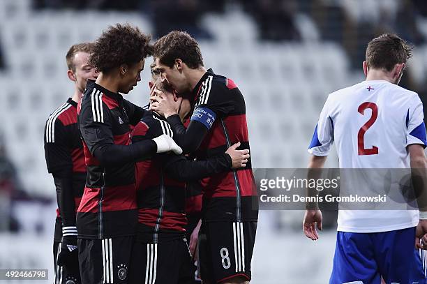 Max Meyer of Germany celebrates with team mates as he scores the opening goal during the 2017 UEFA European U21 Championships Qualifier between U21...