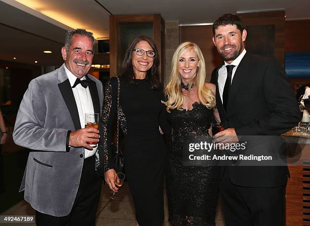 Sam Torrance and his wife Suzanne pose with Padraig Harrington of Ireland and his wife Caroline as they attend the European Tour Players' Awards...