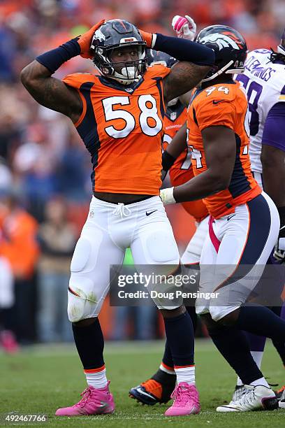 Outside linebacker Von Miller of the Denver Broncos celebrates a tackle against the Minnesota Vikings at Sports Authority Field at Mile High on...