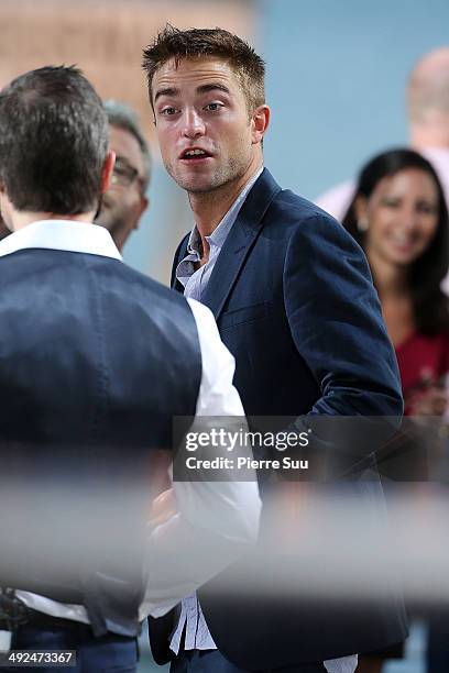 Robert pattinson at 'le grand journal'on day 7 of the 67th Annual Cannes Film Festival on May 20, 2014 in Cannes, France.