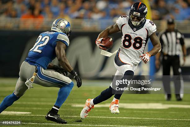 Wide receiver Demaryius Thomas of the Denver Broncos makes a reception against strong safety James Ihedigbo of the Detroit Lions at Ford Field on...