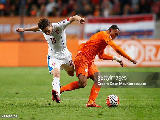 Josef Sural of the Czech Republic and Kenny Tete of the Netherlands battle for the ball during the UEFA EURO 2016 qualifying Group A match between...