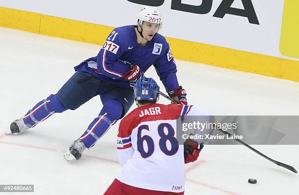 Antoine Roussel of France in action with Jaromir Jagr of Czech Republic during the 2014 IIHF World Championship between France and Czech Republic at...