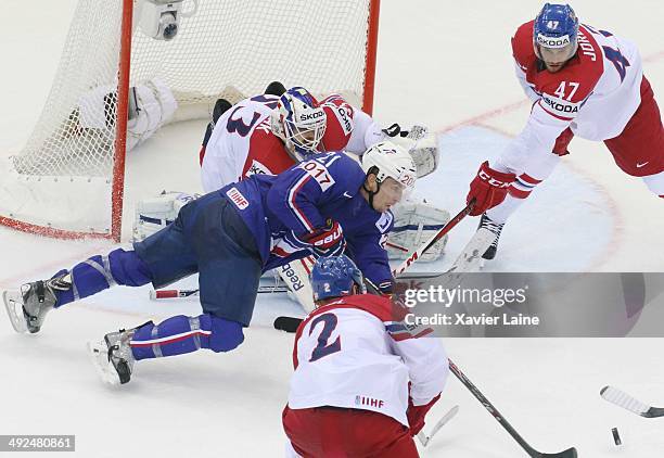 Antoine Roussel of France in action with Alexander Salak and Vladimir Sobotka of Czech Republic during the 2014 IIHF World Championship between...