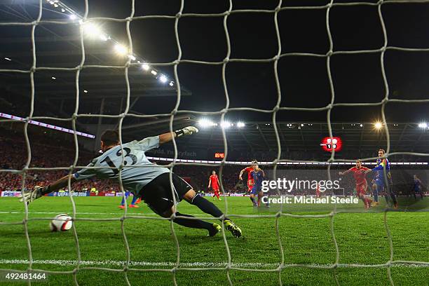 Gareth Bale of Wales shoots past goalkeeper Ferran Pol of Andorra to score their second goal during the UEFA EURO 2016 qualifying Group B match...