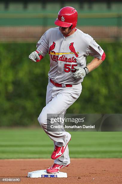 Stephen Piscotty of the St. Louis Cardinals runs the bases after hitting a two-run home run in the first inning against the Chicago Cubs during game...