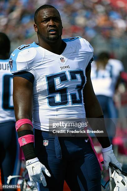 Deiontrez Mount of the Tennessee Titans watches from the sideline during a game against the Buffalo Bills during a game at Nissan Stadium on October...