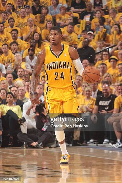 Paul George of the Indiana Pacers moves the ball up-court against the Miami Heat in Game Two of the Eastern Conference Finals during the 2014 NBA...