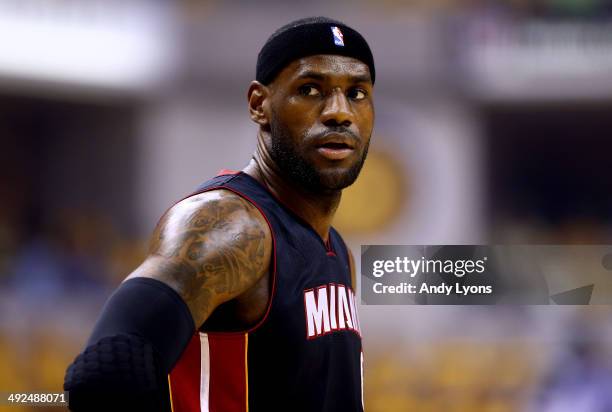 LeBron James of the Miami Heat looks on during Game Two of the Eastern Conference Finals of the 2014 NBA Playoffs against the Indiana Pacers at at...