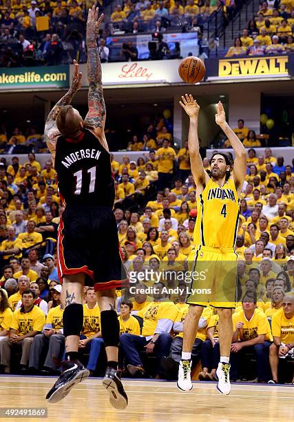 Luis Scola of the Indiana Pacers takes a shot as Chris Andersen of the Miami Heat defends during Game Two of the Eastern Conference Finals of the...