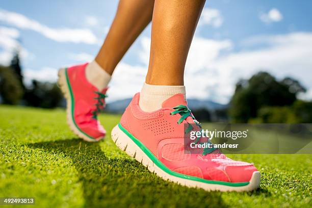 woman running outdoors - pink shoe bildbanksfoton och bilder