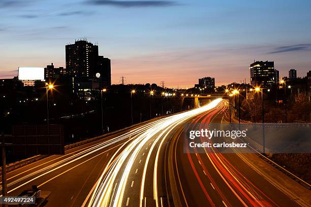 traffic at night - toronto highway stock pictures, royalty-free photos & images