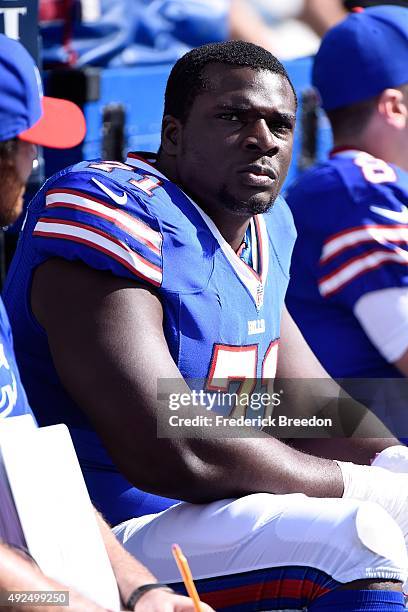 Cyrus Kouandjio of the Buffalo Bills watches from the sideline during a game against the Tennessee Titans during a game at Nissan Stadium on October...