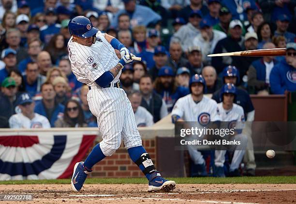 Javier Baez of the Chicago Cubs breaks his bat as he grounds out in the fifth inning against the St. Louis Cardinals during game four of the National...
