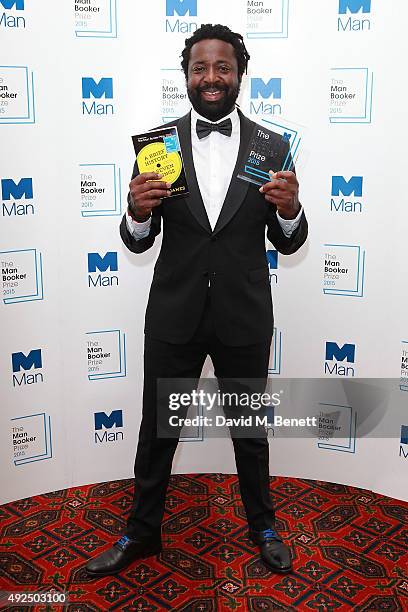 Marlon James poses with the 2015 Man Booker Prize at the winners reception at The Guildhall on October 13, 2015 in London, England.