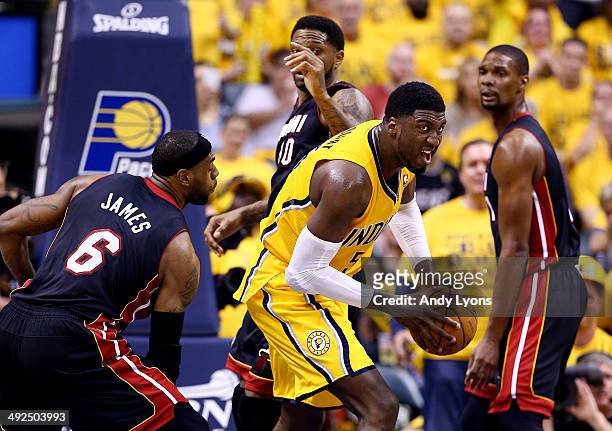Roy Hibbert of the Indiana Pacers gains control of the ball as LeBron James of the Miami Heat defends during Game Two of the Eastern Conference...