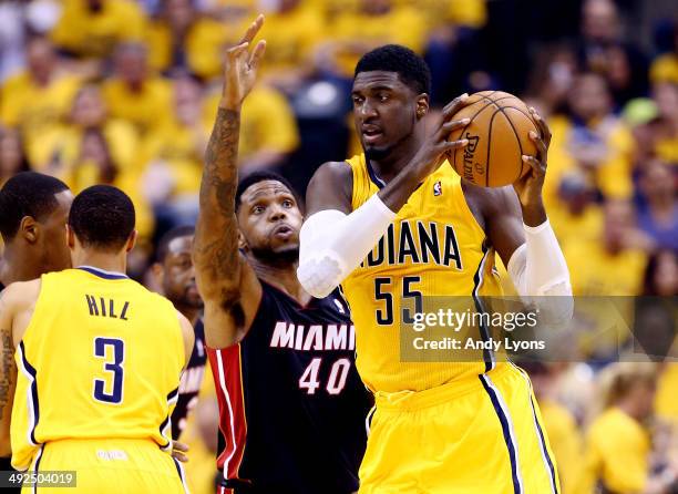 Roy Hibbert of the Indiana Pacers looks to pass as Udonis Haslem of the Miami Heat defends during Game Two of the Eastern Conference Finals of the...