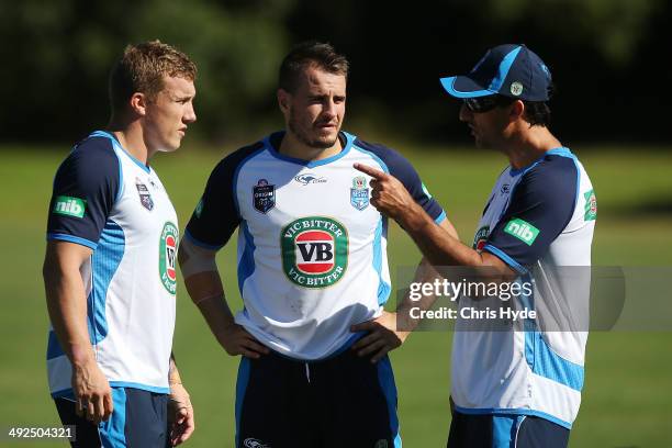 Coach Laurie Daley talks to Trent Hodkinson and Josh Reynolds during a New South Wales Blues State of Origin training session at Novotel Coffs...