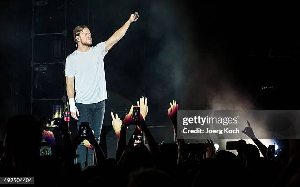 Dan Reynolds of the band Imagine Dragons perform live during a concert at Olympiahalle on October 13, 2015 in Munich, Germany.