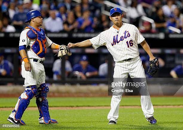 Juan Centeno and Daisuke Matsuzaka of the New York Mets celebrate an out in the eighth inning against the Los Angeles Dodgers on May 20, 2014 at Citi...