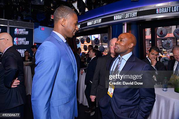 Draft Prospect Andrew Wiggins chats with Head Coach Jacque Vaughn of the Orlando Magic at a reception prior to the 2014 NBA Draft Lottery on May 20,...