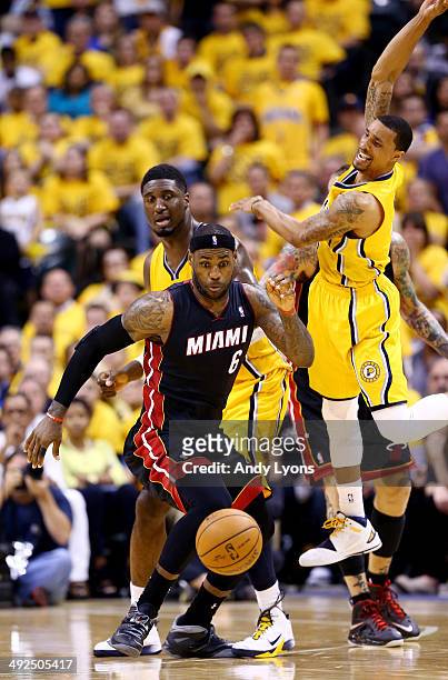 LeBron James of the Miami Heat goes for a loose ball against the Indiana Pacers during Game Two of the Eastern Conference Finals of the 2014 NBA...