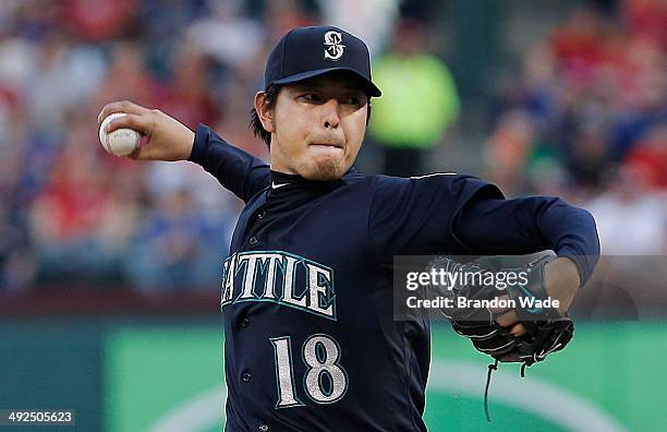 Starting pitcher Hisashi Iwakuma of the Seattle Mariners throws during the second inning of a baseball game at Globe Life Park in Arlington on May...