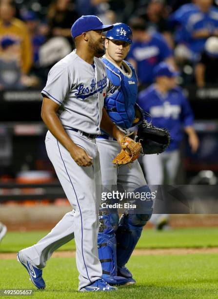 Kenley Jansen and A.J. Ellis of the Los Angeles Dodgers celebrate the 9-4 win over the New York Mets on May 20, 2014 at Citi Field in the Flushing...