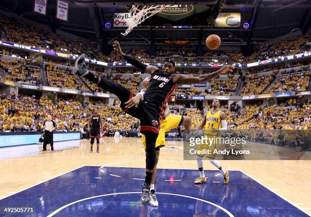 LeBron James of the Miami Heat goes to the basket as David West of the Indiana Pacers defends during Game Two of the Eastern Conference Finals of the...