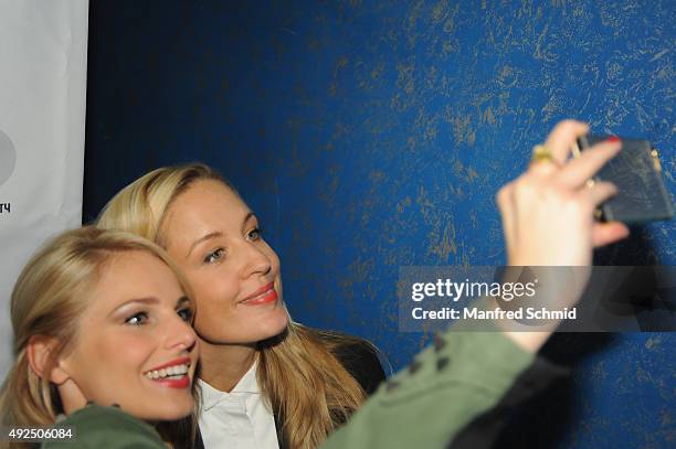 Silvia Schneider and Lilian Klebow pose for a selfie during the 'Beautiful Girl' Vienna premiere at UCI Kinowelt Millenium City on October 13, 2015...