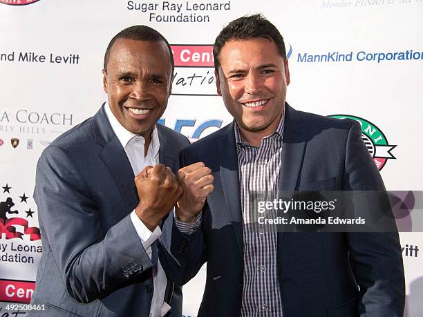 Boxers Sugar Ray Leonard and Oscar de la Hoya arrive at the 5th Annual "Big Fighters, Big Cause" charity boxing night benefiting The Sugar Ray...