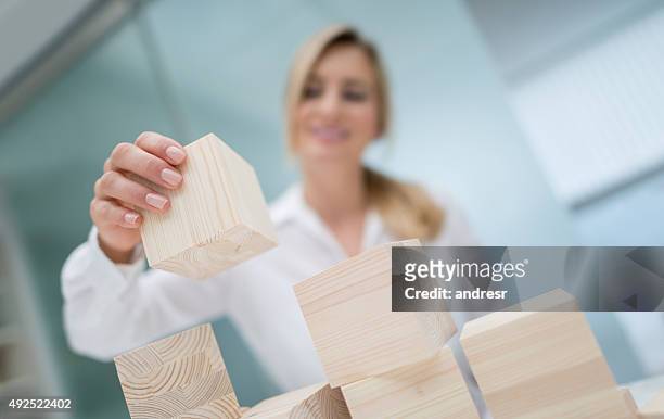 business woman building a project - connect the dots puzzle stock pictures, royalty-free photos & images