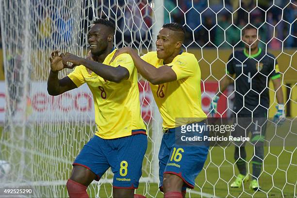 Felipe Caicedo of Ecuador celebrates with Antonio Valencia after scoring the second goal of his team through a penalty during a match between Ecuador...