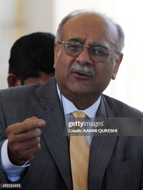 Pakistan's cricket chief Najam Sethi speaks with media representatives outside the Supreme Court building in Islamabad on May 21, 2014. The Pakistani...