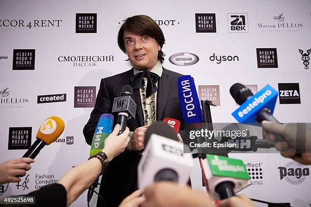 Designer Valentin Yudashkin speaks with journalists before his show during Moscow Fashion Week at Gostiny Dvor on October 13, 2015 in Moscow, Russia.