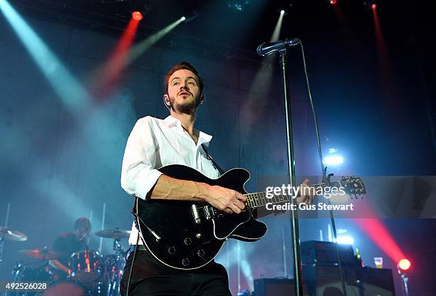 Tom Smith of Editors performs on stage at Eventim Apollo on October 13, 2015 in London, England.