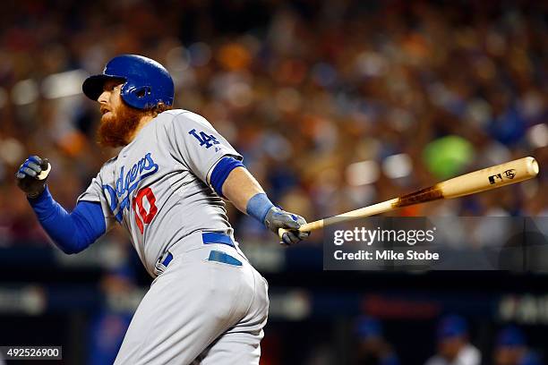 Justin Turner of the Los Angeles Dodgers hits a two run RBI to score Howie Kendrick and Adrian Gonzalez against Steven Matz of the New York Mets in...
