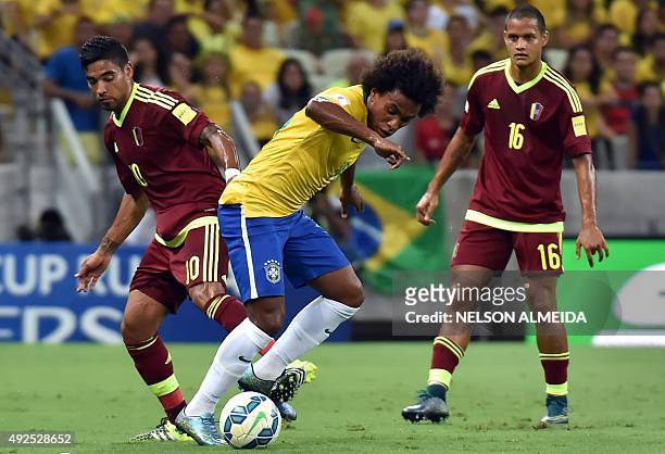 Venezuela's Ronald Vargas and Brazil's Willian vie for the ball next to Venezuela's Roberto Rosales during their Russia 2018 FIFA World Cup South...